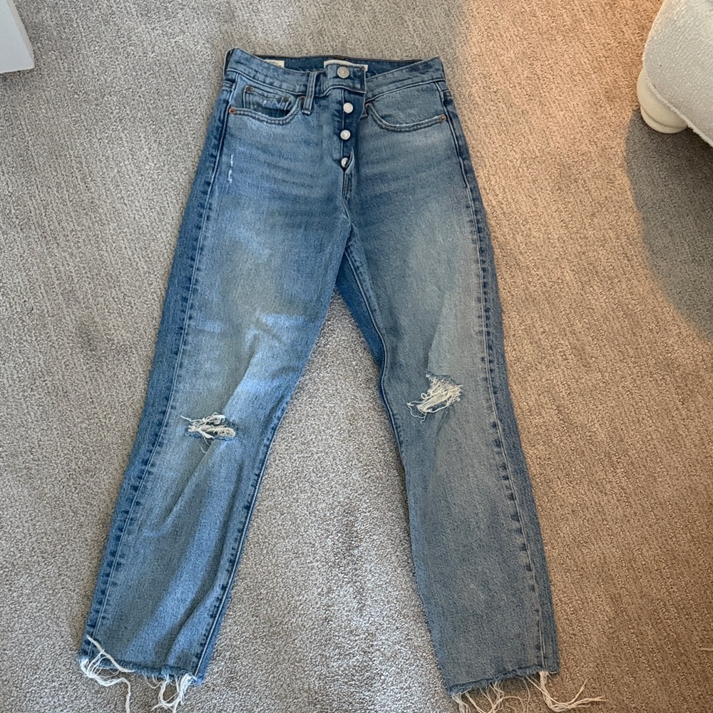 Levi's High Rise Blue Jeans with Distressed Details